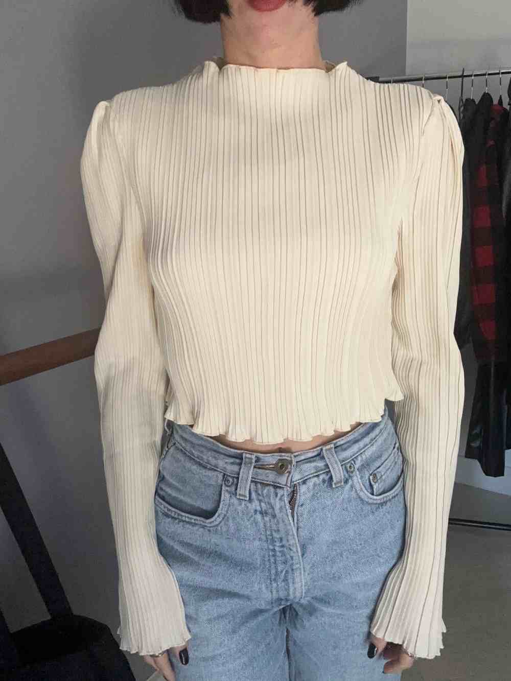 Maglia bianca a pieghe