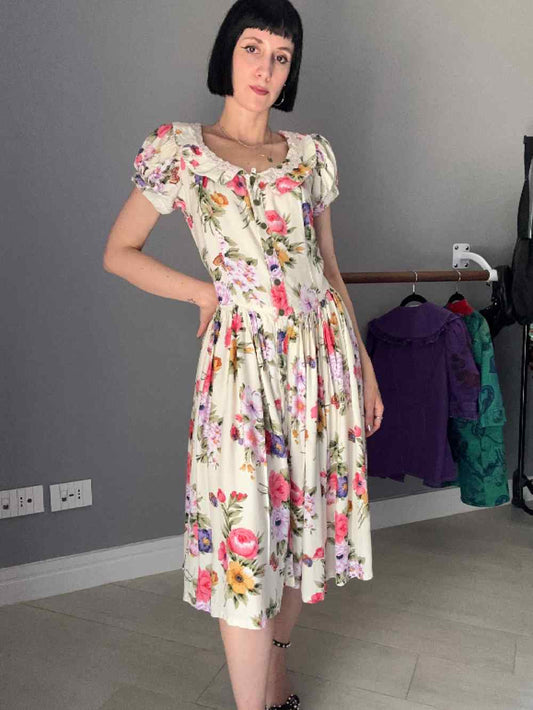 Abito panna con fiori