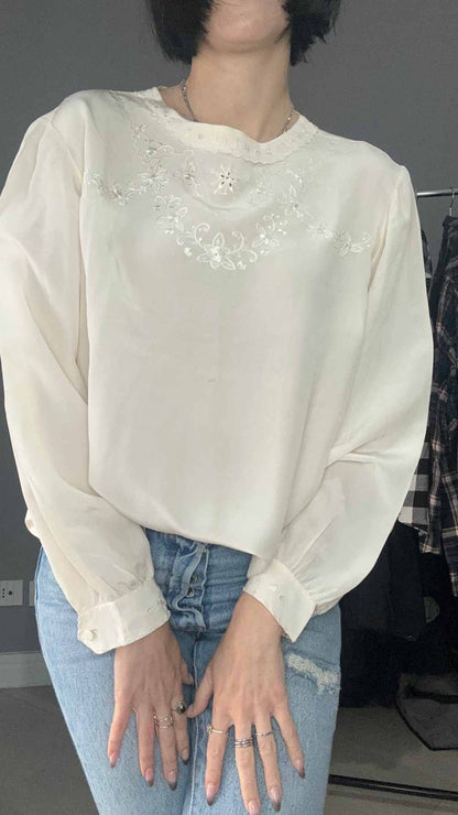 Blusa in seta bianca