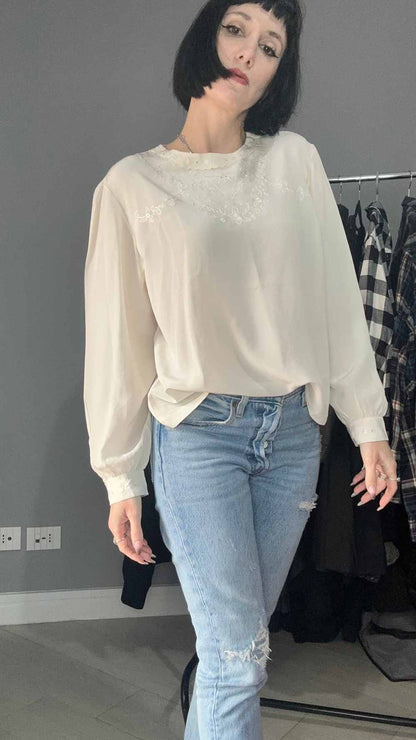 Blusa in seta bianca