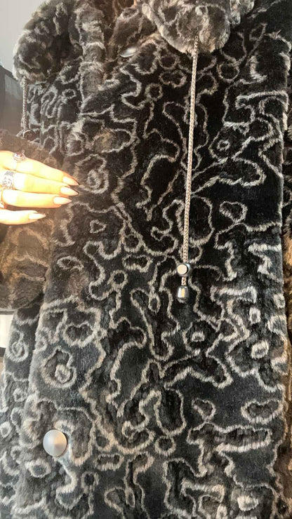 Pelliccia sintetica decorata