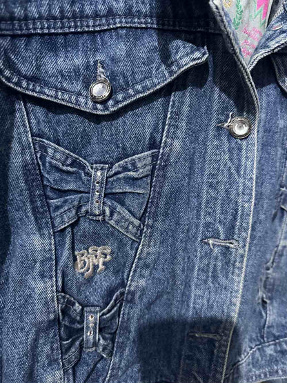 Giubbotto di jeans con fiocchetti