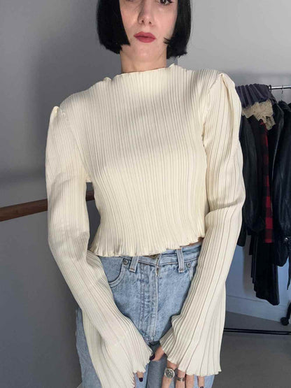 White pleated sweater