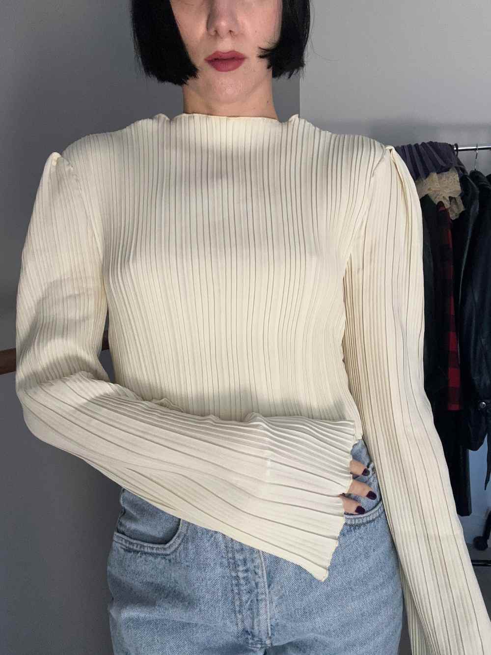 White pleated sweater